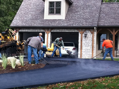 The Crew Working on a Driveway.